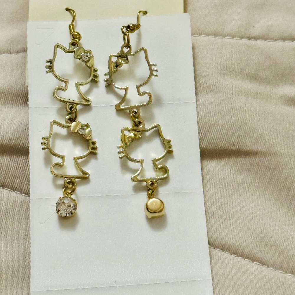 2/$15 Gold tone Hello Kitty earrings 2 on each earring rhinestones-3 …
